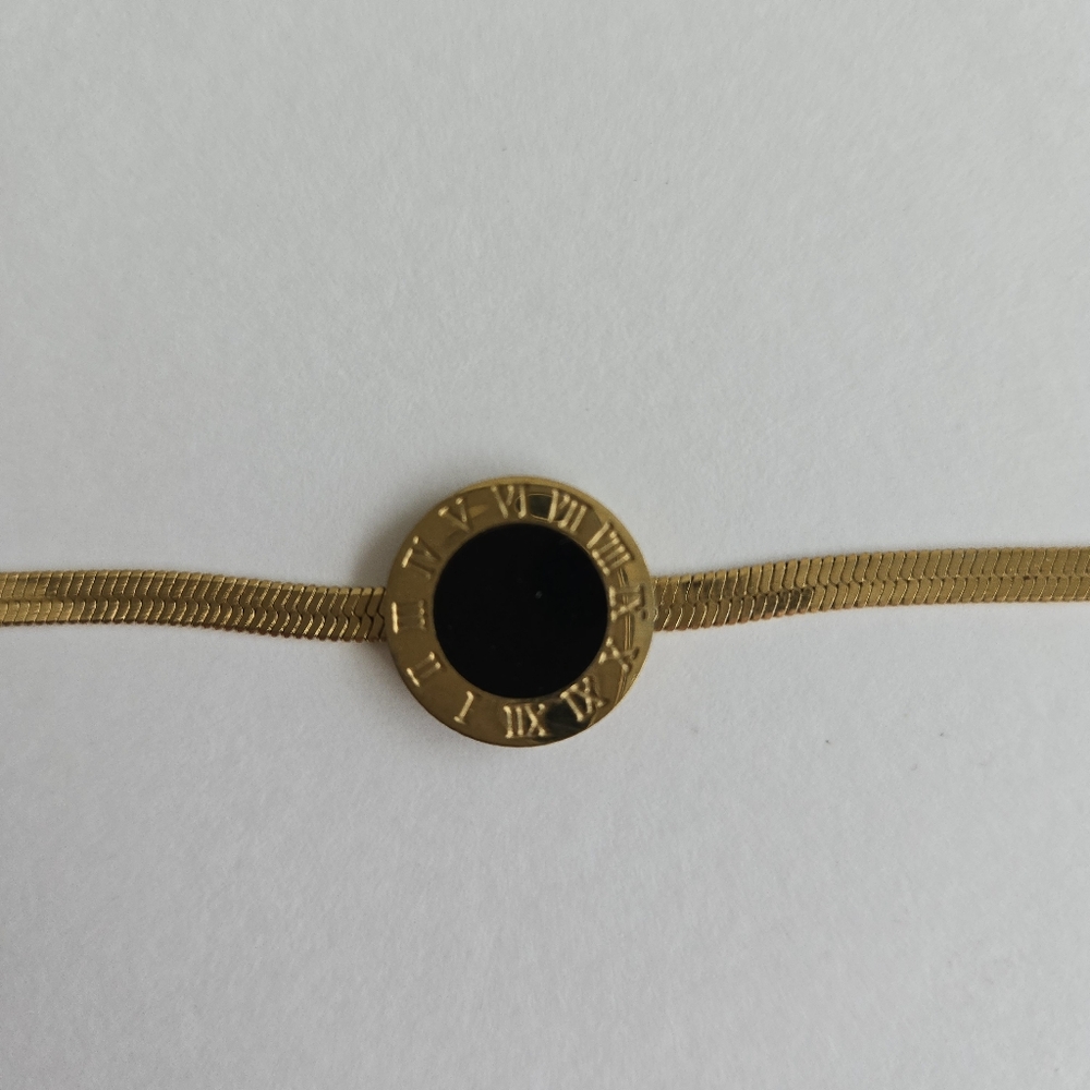 Roman numeral black dial gold herringbone chain bracelet 6 inch